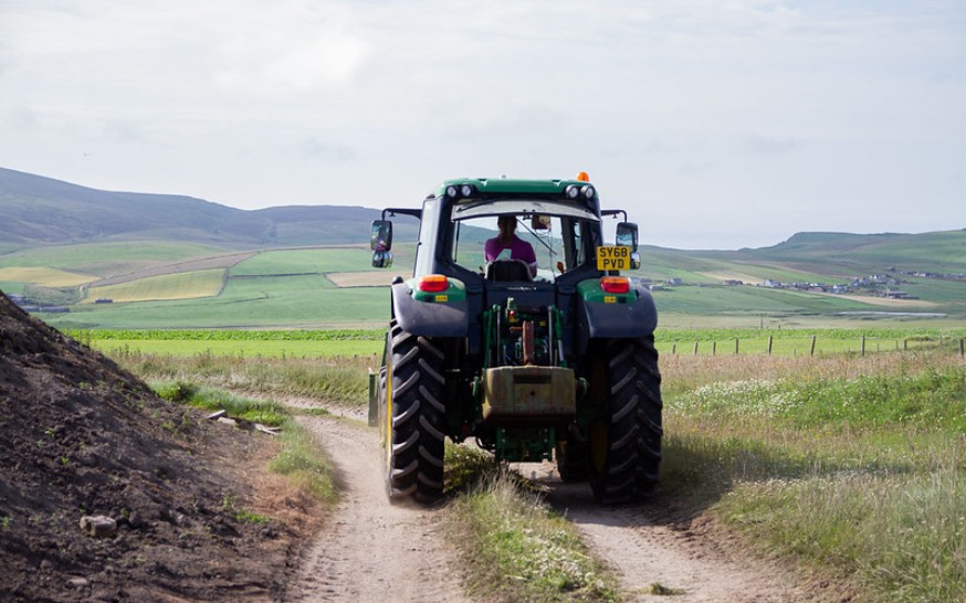 Image showing a women in agriculture driving a tractor